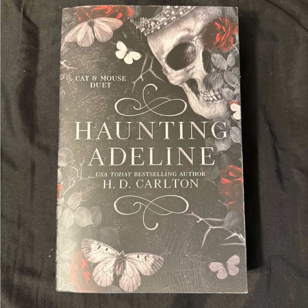 Haunting Adeline Book with Black and Red Cover